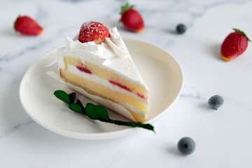Christmas and birthday shortcakes on the table
