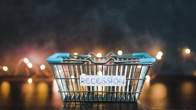 economy after covid, recession text on empty shopping basket  on dark background with lights