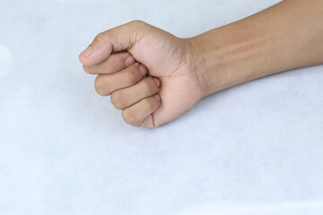 asian hand concept that is forming a game of rock paper scissors isolated with white backgorund