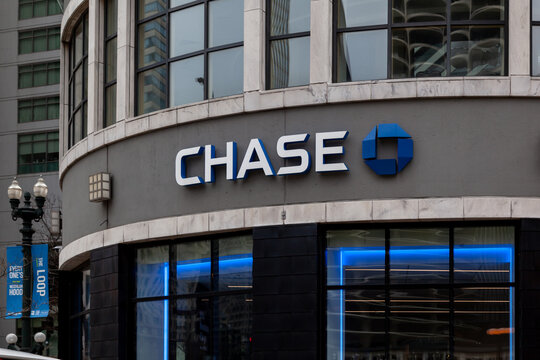 Chicago, Illinois, USA - March 29, 2022: Close up of Chase bank sign on the building. JPMorgan Chase is an American investment bank and financial services holding company. 