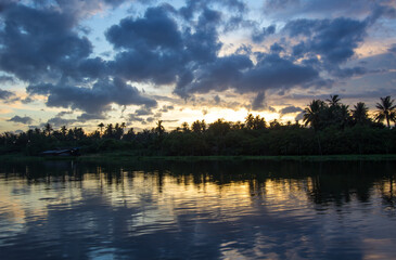 Obraz premium Twilight sky and countryside view along Tha Chin river(Maenam Tha Chin),Nakhon Pathom,Thailand