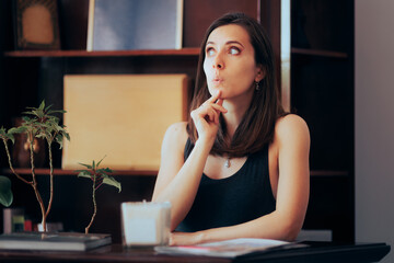 
Funny Receptionist Thinking Feeling Puzzled. Concerned front desk girl curious about an administrative issue 
