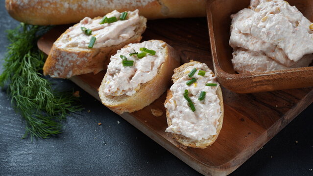 French baguette with or Sandwiches with smoked salmon and soft cream cheese pate or mousse