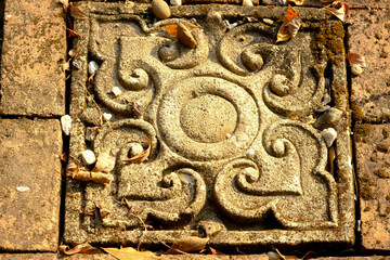 Stucco wall art in public temple, Thailand