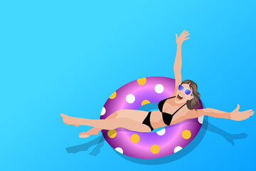 Beautiful girl is swimming on the inflatable ring in the swimming pool. happy summer holiday