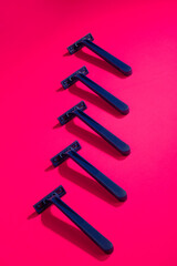 Abstract still life with razors on a colored background