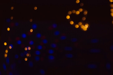 Bokeh background of the lights in the city and shop  lamps out of focus
