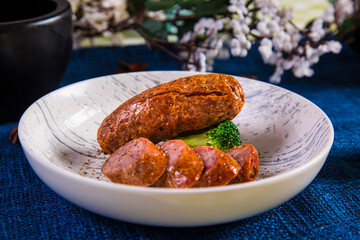 sausages with potatoes and tomatoes