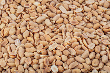  Roasted peanuts background. Seamless pattern of roasted peanuts. Close-up. View from above.