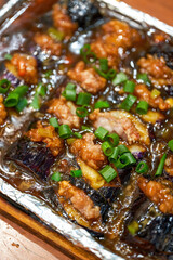 A delicious Chinese dish, teppanyaki eggplant stuffed with meat