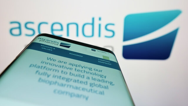 Stuttgart, Germany - 06-11-2022: Mobile phone with website of biotechnology company Ascendis Pharma AS on screen in front of business logo. Focus on top-left of phone display.