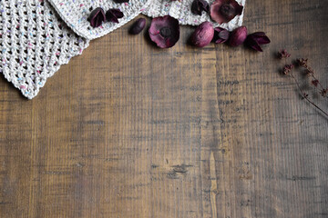 Wooden background with crochet edging rustic vintage