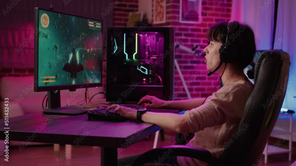 Poster woman relaxing and streaming on internet fast paced space shooter simulation gameplay while talking 