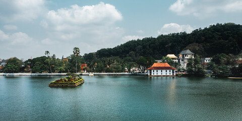 Skyline aerial view of Kandy lake and temple, beautiful stunning place in the heart of Kandy city in Sri Lanka. Famous historical and Buddhism landmark Sri Dalada Maligawa, Sacred Tooth Relic The