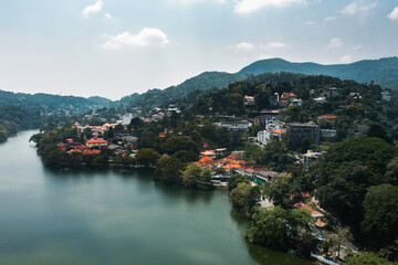Skyline aerial drone view of Kandy lake, stunning place in the heart of Kandy city in Sri Lanka....