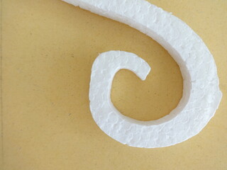 Abstract White Curved Shape on Yellow Background