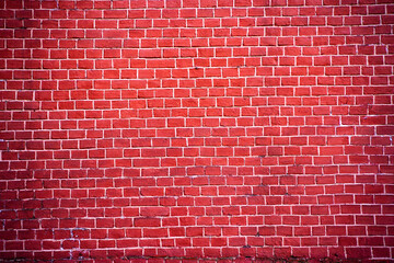 An authentic fragment of the red brick wall of the Moscow Kremlin in Russia. Brick red background for design. High quality photo