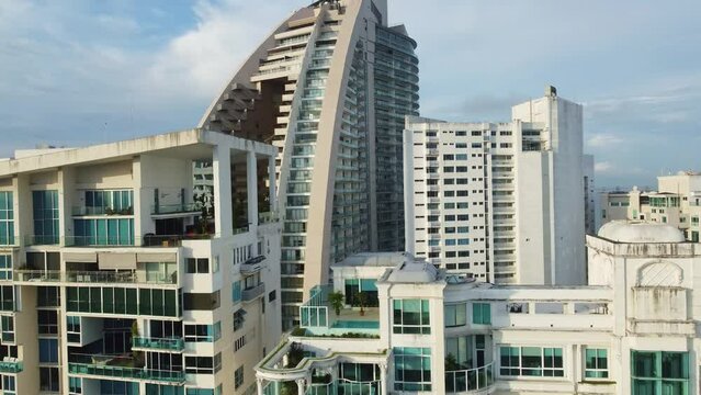 Panama city: Aerial drone footage of luxury condominium towers and hotels in the  Punta Pacifica by the Pacific ocean in Panama in Central America. Shot with an upward and tilt down motion
