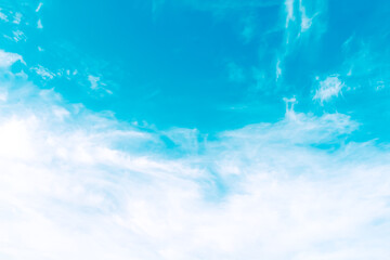 White clouds on blue sky background with light wind
