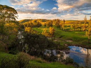 Obraz premium autumn landscape with river and trees