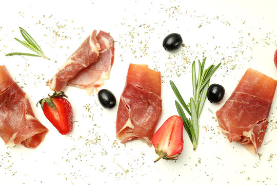 Concept of delicious food with jamon on white background