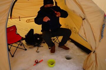 Obraz na płótnie Canvas Smelt Ice Fishing at Lake Abashiri in Hokkaido, Japan - 日本 北海道 網走湖 ワカサギ釣り 