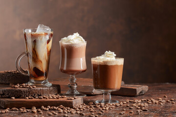 Coffee and chocolate drinks with whipped cream.