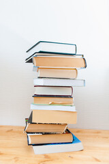 Stack of old books on the table