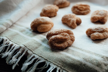 Bakery products. Homemade cookies with sugar on a towel background. Background image, copy space.