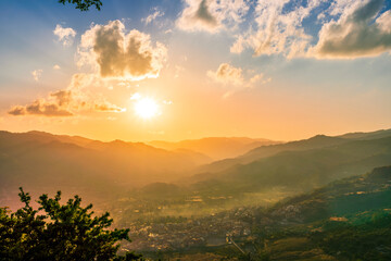 picturesque highland landscape with amazing view from mountain with green branches and leaves on sides