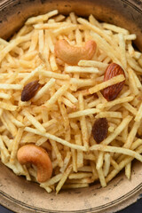 Indian style deep fried snacks falahari chivda, Chewda - chivda or mixture namkeen with dry fruits