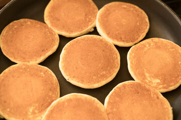 Pancakes in a pan. Delicious homemade pancakes background cooking for breakfast or lunch