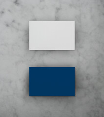 Blank white and blue business name card mockup on grey marble background, Top view, 3D rendering