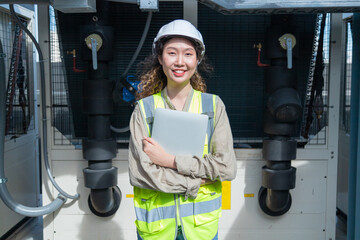 Engineer under checking the industry chilled water fan coil unit air conditioner is water cooling...