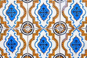 Fototapeta na wymiar Portugal Traveling. Colorful Vintage Azulejo Tiles on One of the Houses in Lisbon City in Portugal.