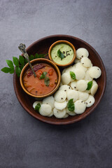 Mini idli is the smaller version of soft and spongy round shaped steamed regular rice idli, also...