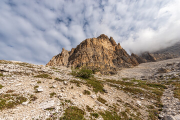 Fototapeta na wymiar Mountain peaks of the Sesto Dolomites. South rock face of three peaks of Lavaredo (Tre Cime di Lavaredo or Drei Zinnen), UNESCO world heritage site, Trentino-Alto Adige and Veneto, Italy, Europe.