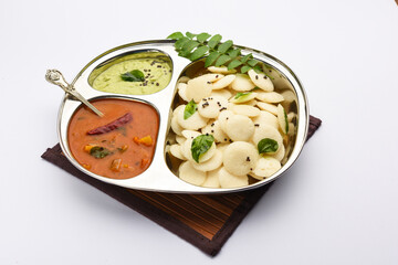 Mini idli is the smaller version of soft and spongy round shaped steamed regular rice idli, also...