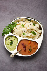 Mini idli is the smaller version of soft and spongy round shaped steamed regular rice idli, also known as button and cocktail idly