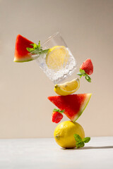 Drink levitation wiht watermelon, lemon, strawberry and fresh mint flying with detox fruit water...