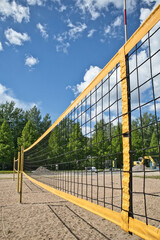 Fototapeta na wymiar yellow beach volleyball net outdoors