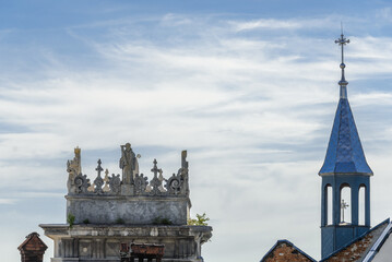 Ukraine, Lviv, VUL. VICHEVA, 2 - June, 2022: Mannerist attic of tower of CHURCH OF ALL SAINTS...