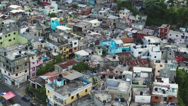 Refugee Refuge In The Poor Neighborhoods Of Santo Domingo. A Sad Ghetto In A Wealthy Metropolis. Exclusion Zone In Latin America. Slums Of The Dominican Republic, Aerial View.