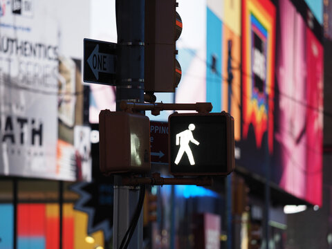 Image of a pedestrian traffic light near Times Square.