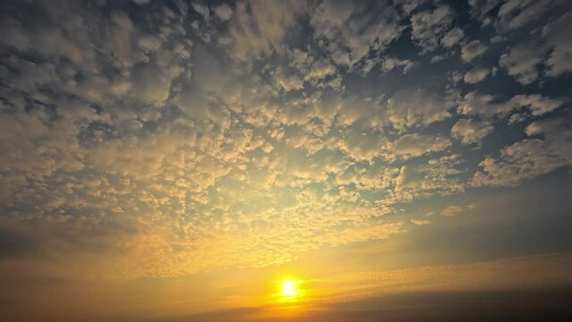 Beautiful sky clouds nature landscape at sunset. Colorful clouds move on the blue sky. 4k time lapse video.