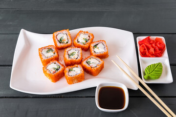 Philadelphia sushi roll on plate