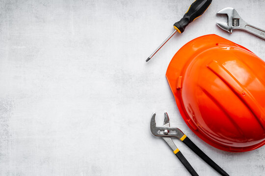 Engineer safety helmet with construction tools, top view
