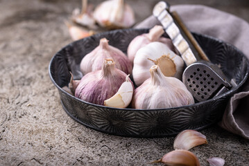 Fresh organic garlic on table