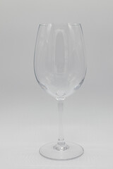 empty wine glass on white background.