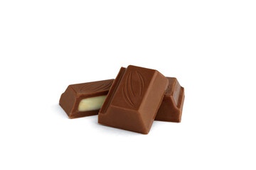 Chocolate pieces with milk filling isolated on white background.